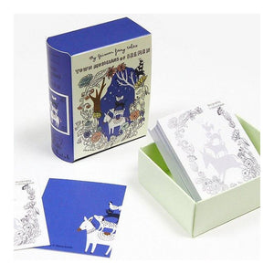 A boxed card deck titled 'My Dreamy Fairy Tales' shown with its illustrated blue-and-cream packaging, an open pale green box containing white illustrated cards, and a few loose cards on a clean white background.