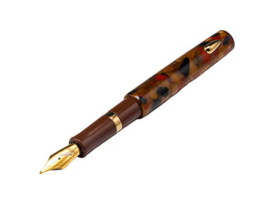 A luxury fountain pen with a tortoiseshell-patterned barrel in shades of brown, black, and red, featuring a polished gold nib and gold trim rings, photographed on a clean light gray background.