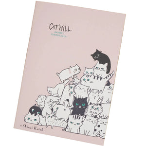 Sheet of paper with black and white cat illustrations on a pink background, featuring the artist's name 'Shinzi Katoh'.