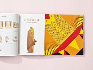 Open book with a colorful illustration of a fish on a pink background by Cochae