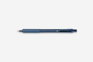 A blue retractable pen with a textured grip and metallic accents, positioned horizontally on a clean, light gray background.