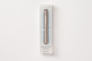 A silver mechanical pencil refill case in its clear plastic packaging, displayed against a clean white background.