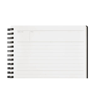 A white lined notepad with a black spiral binding on the left side, shown against a plain white background.