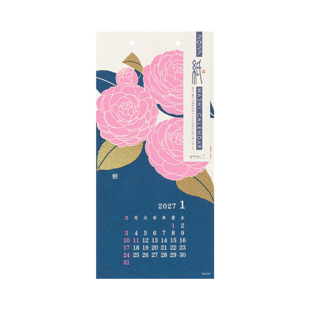 A vertical hanging desk calendar cover for January 2027, featuring large pink flowers with gold and dark green leaves on a navy blue background, with a cream header strip labeled 'NOAN WASH CALENDAR'.