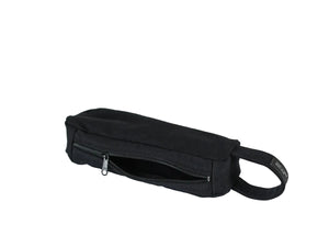 A black canvas waist bag with a zippered front pocket and a black webbing strap nomado store.