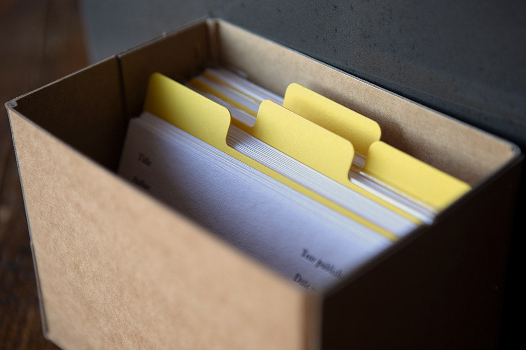 Notebook archive boxes with dividers