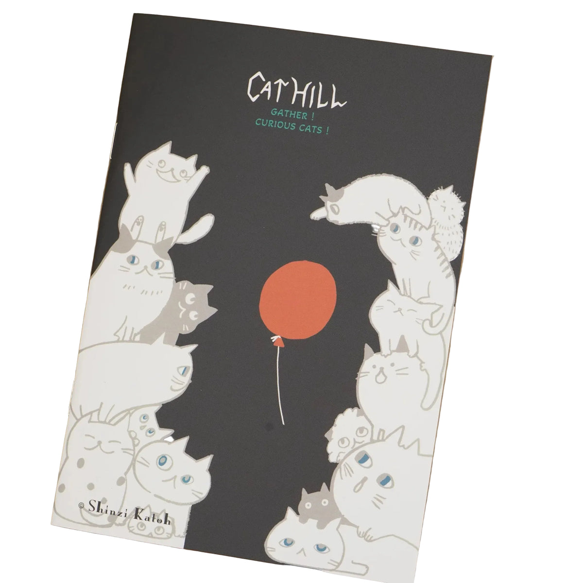Booklet with cat illustrations and a red balloon design by Shinzi Katoh