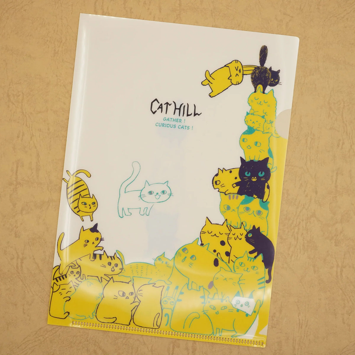 Notebook with cat illustrations on a beige background