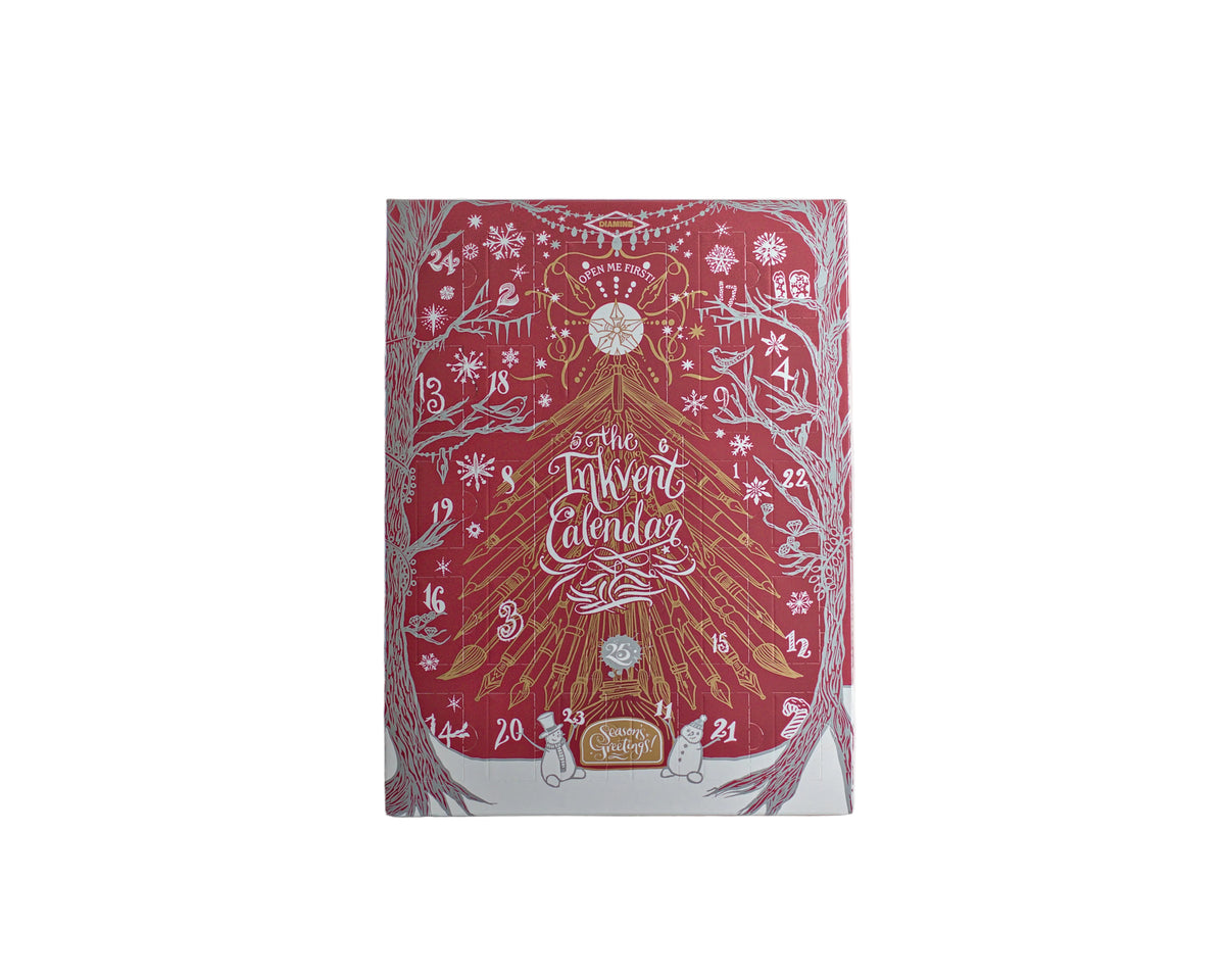 The Twelfth Calendar advent box by Diamine featuring a festive red cover decorated with silver-white snowflakes, trees, and gold-toned illustrations of a Christmas tree and gifts.