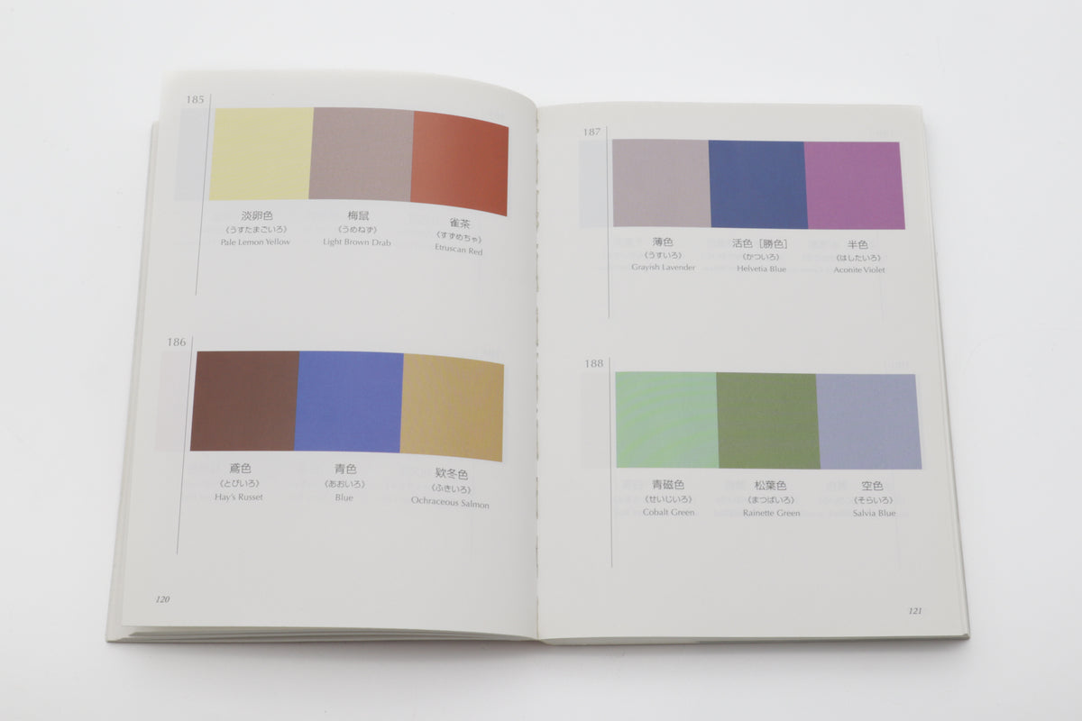 Open book displaying color swatches on a white background