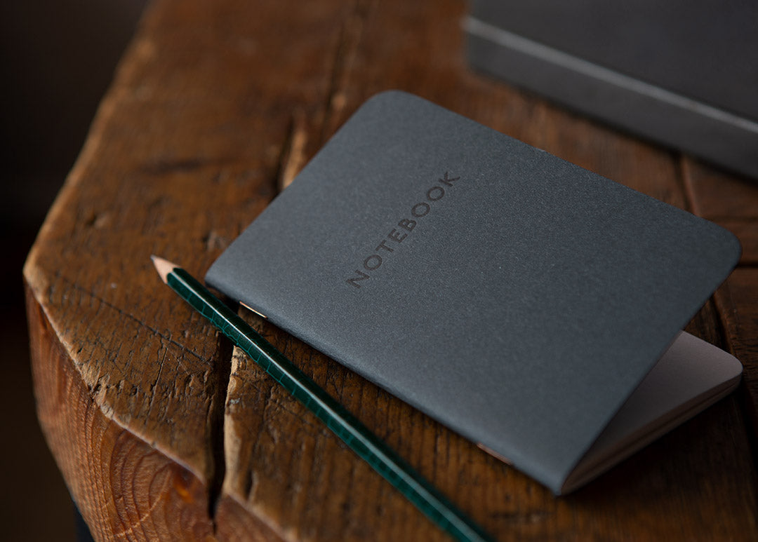 Pack of three grey pocket notebooks