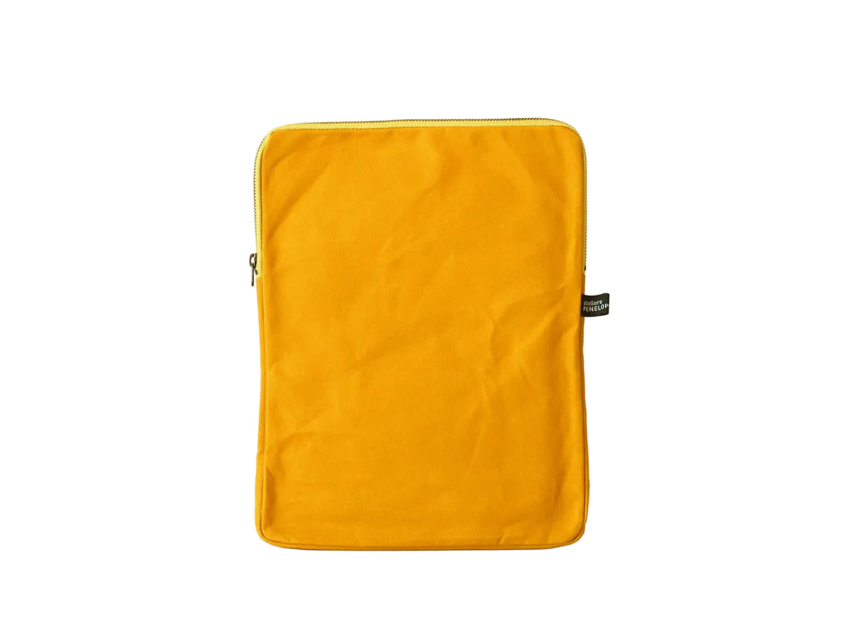 A mustard yellow fabric sleeve or pouch with a zipper closure, standing upright against a plain white background.