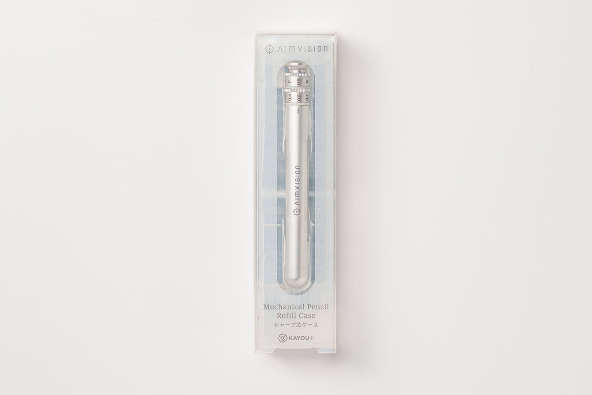 A silver mechanical pencil in a clear plastic retail box, photographed against a clean white background.