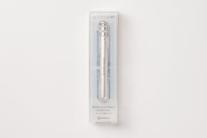 A silver mechanical pencil in a clear plastic retail box, photographed against a clean white background.