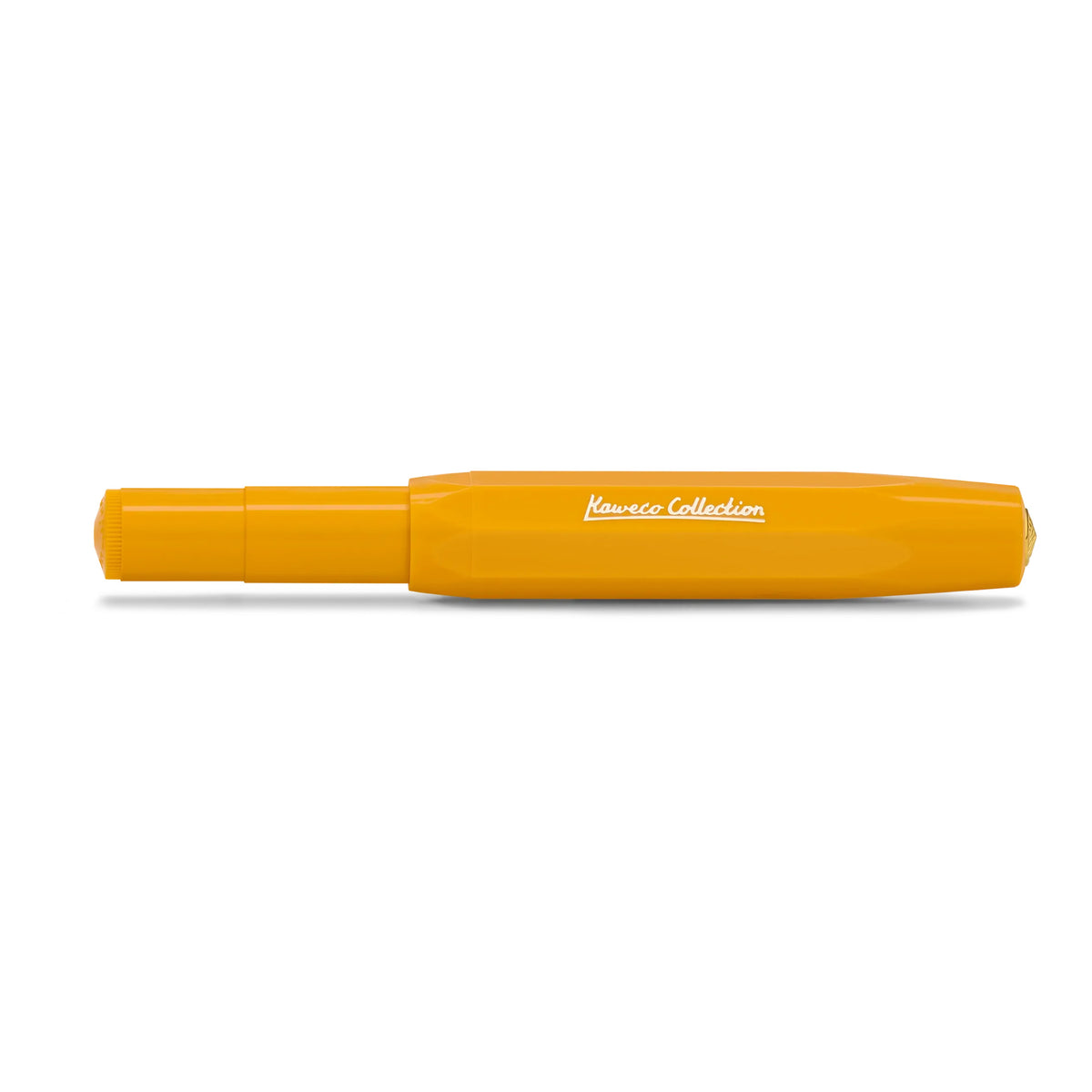 A bright yellow-orange pen with 'Kamusco Collection' printed in white script on the side, shown against a plain white background.