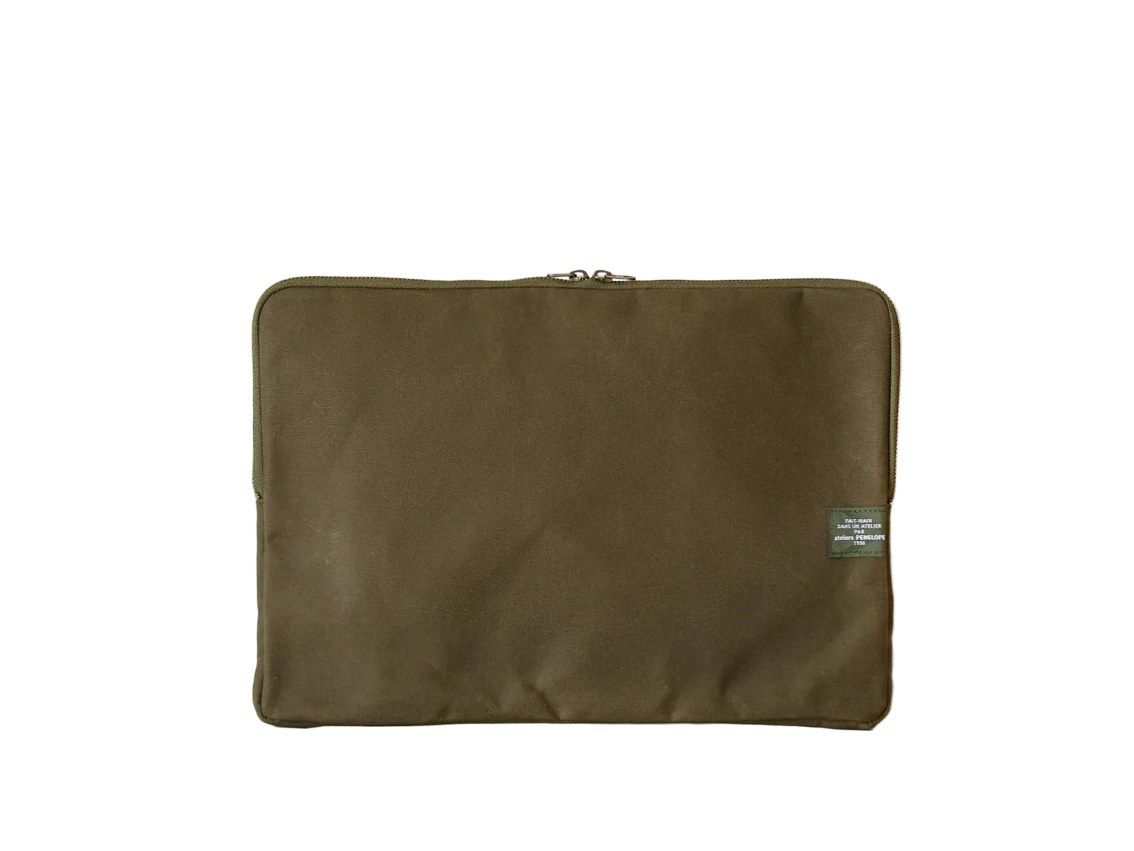 Green fabric pouch with a patch on a white background