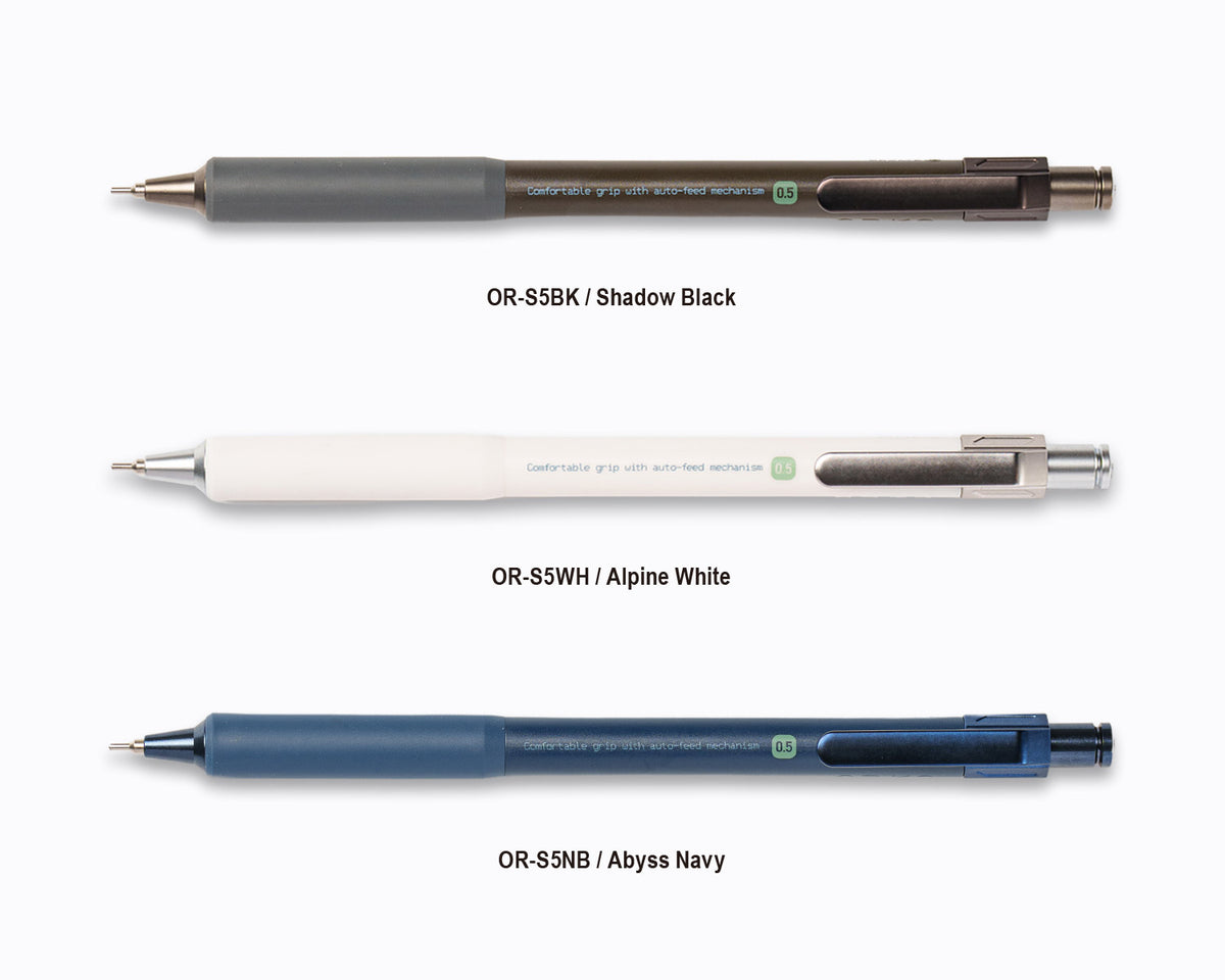 Three mechanical pencils shown vertically on a white background, labeled OR-S5BK / Shadow Black, OR-S5WH / Alpine White, and OR-S5NB / Abyss Navy. Each pencil has a textured grip section and a clip near the top.
