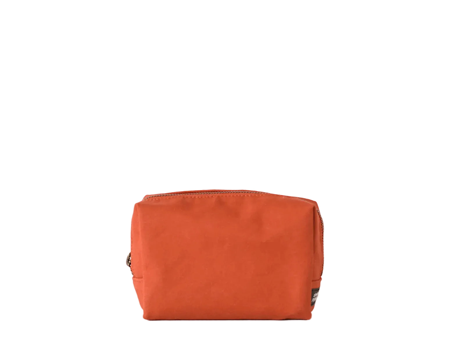 A rectangular orange cosmetic pouch with a zip-top closure, photographed against a clean white background.