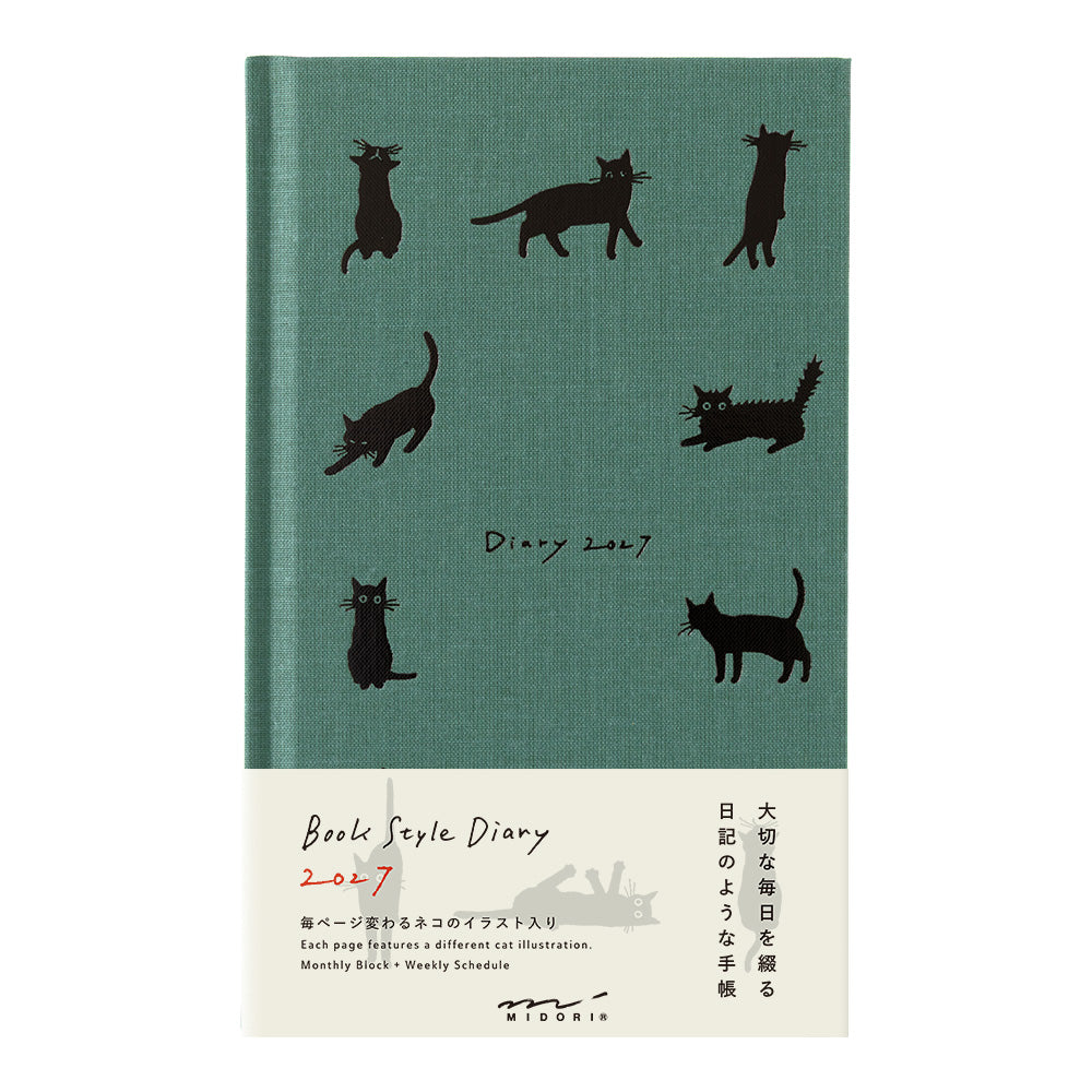 A 2027 daily diary with a textured teal-green cover decorated with black cat silhouettes, featuring a cream-colored lower third with English and Japanese text and a small kitten illustration.