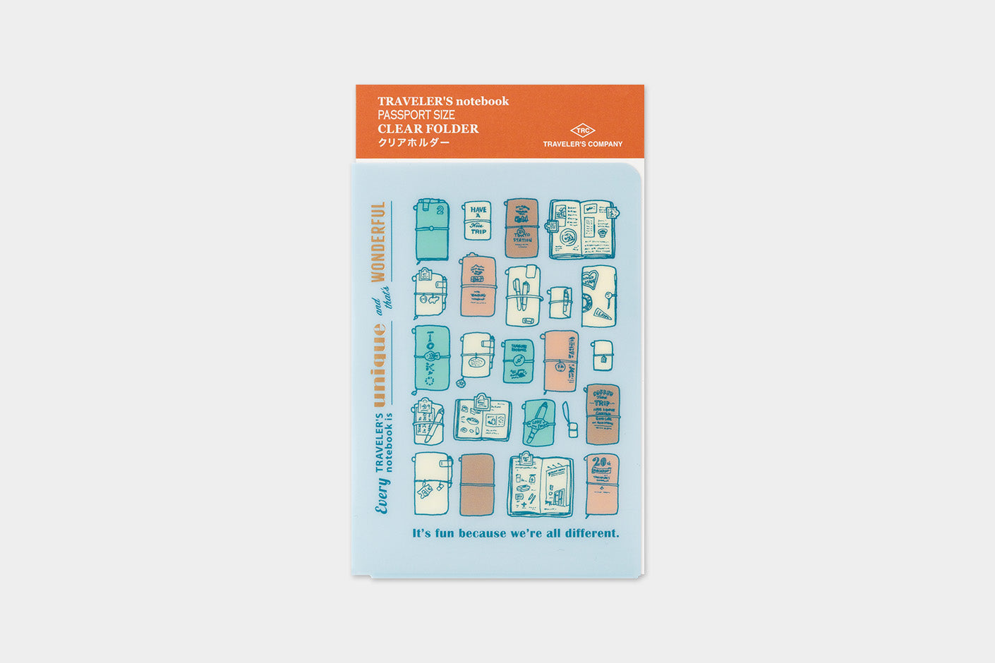 A packaged clear travel notebook folder shown on a light gray background. The top header is orange and reads 'TRAVELERS notebook CLEAR HOLDER,' with a blue card below featuring illustrated travel-themed icons in pastel blue, peach, and orange.